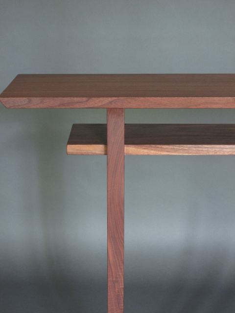 A walnut console table with beautiful grain patterns