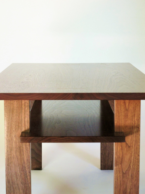 Our narrow coffee table features beautiful handmade details like the carefully hand-cut joinery of the inset shelf