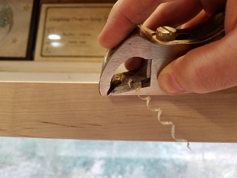 The table top of our Statement Table gets the finishing touches with a small hand plane used to shape the edge profile