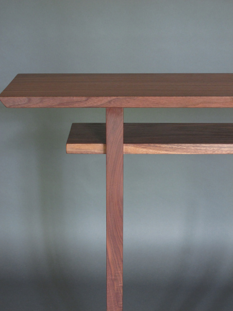 A walnut console table with beautiful grain patterns