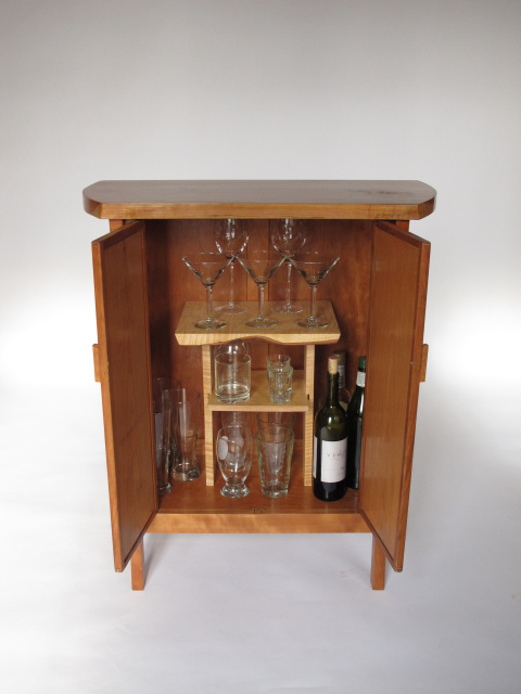 Cherry Bar Cabinet, unique glassware and closed liquor cabinet storage
