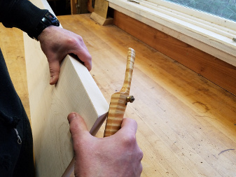 a spokeshave is used to shape the corner edges of our Statement Table top - a slab of tiger maple is prepared to become our Statement Server