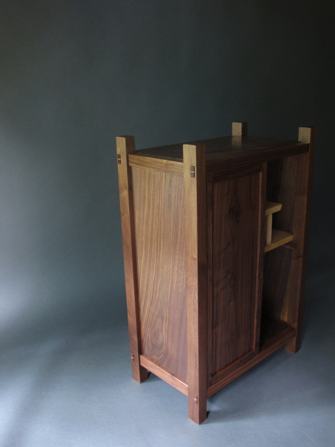 stunning walnut bar cabinet with dramatic floating panels, modern solid wood furniture
