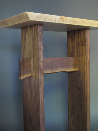 Our stand up desk with a walnut base and live edge stretcher