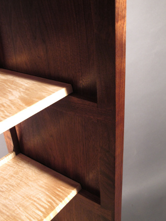 Hand-cut dovetail rails act as shelf supports while also locking together the frame of our Tall Case - the dovetails are left visible so that the fine craftsmanship can be enjoyed- handmade solid wood fine furniture