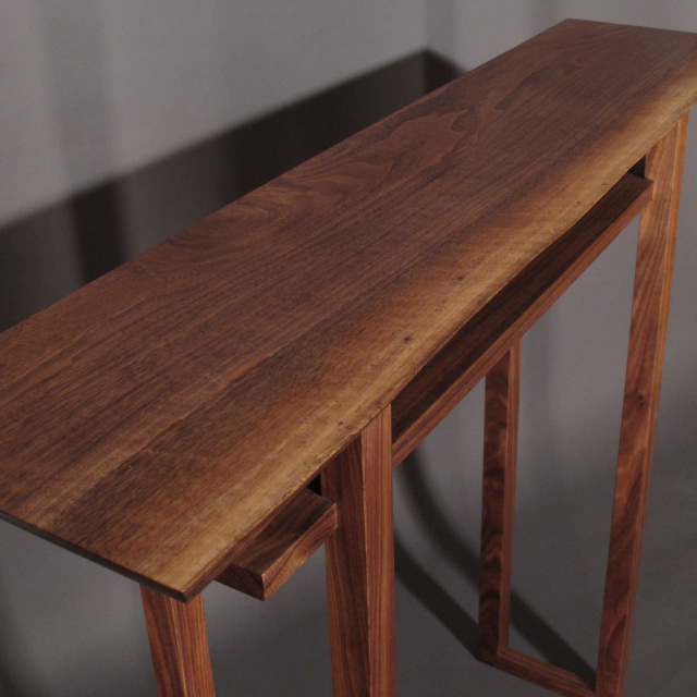 A narrow hall table with Live edge table top in Walnut- mid century modern furniture design for an entry console table, for narrow hallways, or narrow side tabel